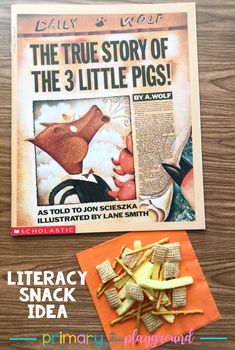 the story of the three little pigs is displayed next to a pile of crackers