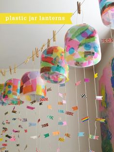 colorful paper lanterns hanging from strings in a room with text overlay that reads plastic jar lanterns