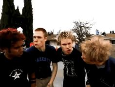 a group of young men standing next to each other