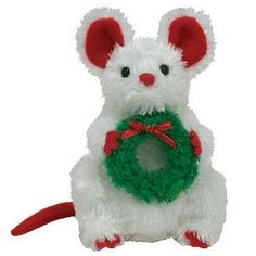 a white stuffed animal with a wreath around it's neck and ears, on a white background