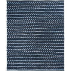 a blue rug with wavy lines on it