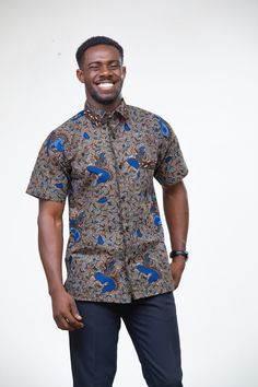 This men's shirt is made from a beautiful African print fabric also known as Ankara fabric.  All our clothes are made in Ghana with the finest craftsmanship. This shirt comes in various sizes from Medium to Extra Extra Large. The size chart in the photos shows the various measurements.  We offer custom sizes if you would prefer that. Custom-made sizes take 5 to 10 working days to process and come at a 10% extra charge. Brown Printed Cotton Shirt, Relaxed Fit Shirt With Batik Print, Ankara Shirts For Men, Ankara Shirt, Mens Dress Shirts, Wax Fabric, Cotton Gifts, African Print Fabric, Ankara Fabric