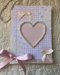 a card with pearls and bows on it