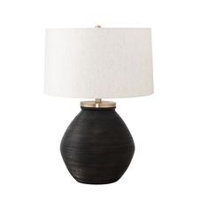 a black table lamp with a white shade