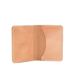 The Passport Wallet can hold all your essentials in one place. Not only is there a spot for your passport, you can fit credit cards, cash and plane tickets in there. Made with vegetable tanned leather.