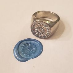 This signet ring is cast in lead-free pewter. The ring size when cast is 7.25. The sealing image is the a nest of the white-spotted pufferfish. The male pufferfish builds these nests as part of the courtship process to attract a mate. This is part of a series of signet rings I am making cast from lead-free pewter. Each master ring is hand sculpted to give a unique, rustic style, multi-dimensional relief image when used as a stamp to seal, with sealing wax. Pewter Ring, Lady Godiva, Resize Ring, Puffer Fish, Silver Fish, Multi Dimensional, Signet Rings, Sealing Wax, Wax Seal