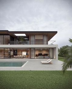 a modern house with a pool in the yard