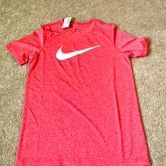 Size Medium New With Tags Nike University Red Crew Neck T-shirt, Nike Casual T-shirt In University Red, Nike Red T-shirt For Summer, Nike Red Sporty Tops, Nike Sporty Red Top, Nike Short Sleeve Pre-shrunk Tops, Red Nike T-shirt For Summer, Red Moisture-wicking T-shirt For Summer, Nike Red Graphic Tee Top