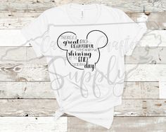 a white shirt with the words disney and mickey mouse on it