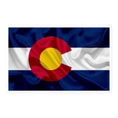 the flag of colorado is waving in the wind with white and blue stripes on it