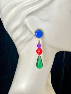 "This pair of earrings is so totally 80s! Fabulous dangle drop design and rad jewel tones colors completes this look. Go big and go bold! Pierced stud style. About 3 1/2\" drop Overall wonderful vintage condition.  Questions invited. FOLLOW ME ON INSTAGRAM @gababoutvintage Is there something in my shop you've fallen in love with but it's a little out of your price range? Just message me and make an offer. I'm usually willing to negotiate on price. I'm in business to sell vintage items, not store Mod Earrings, 80s Jewelry, Totally 80s, 80s Earrings, Jewel Tone Colors, Stud Style, Drop Design, Statement Drop Earrings, Earrings Inspiration