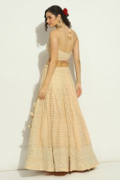 Peach attached cancan lehenga with swarovski, chikankari embroidery in floral pattern. Paired with halter neck embroidered padded blouse and cutwork border embroidered dupatta. - Aza Fashions Cancan Lehenga, Lehenga Pattern, Chikankari Embroidery, Net Embroidery, Floral Lehenga, Padded Blouse, Embroidered Lehenga, Embroidered Dupatta, Cut Work