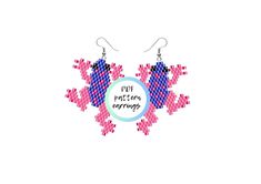 a pair of pink and blue earrings with the words ppf petrons on it