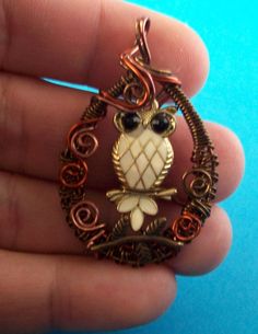 Various colors of copper wire are hand woven and sculpted into a 1 1/4 X 1 inch frame for a white enameled bronze owl. Comes with a FREE 24 inch antique copper chain with lobster claw clasp. (Chain length can be customized on request.) Your one of a kind necklace is ready to ship safely via USPS to your US location at no extra cost. (International shipping available.) Unique Bronze Jewelry For Gifts, Unique Bronze Jewelry For Gift, Artisan Bronze Jewelry For Gift, Vintage Handmade Copper Jewelry, Decorative Metal Jewelry Gift, Nickel-free Brown Jewelry For Gifts, Handmade Unique Wire Necklaces, Unique Handmade Wire Necklaces, Copper Wire Round Pendant Jewelry Gift