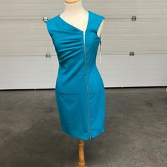 Calvin Klein Turquoise Dress New With Tags Size 4 Gold Zipper Accent Blue Fitted Mini Dress With Side Zipper, Blue Mini Dress With Side Zipper, Blue Dresses With Side Zipper, Fitted Blue Dress With Side Zipper, Blue Sleeveless Dress With Side Zipper, Blue Summer Dress With Side Zipper, Blue Knee-length Dresses With Side Zipper, Turquoise Fitted V-neck Mini Dress, Chic Turquoise Fitted Dress