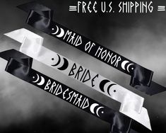 three black and white arrows with the words free u s shipping written on them in cursive writing