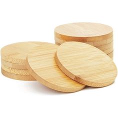 four bamboo coasters stacked on top of each other