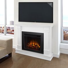 a fireplace with a flat screen tv above it