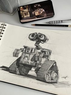 a pencil drawing of a robot on top of a table next to a cell phone