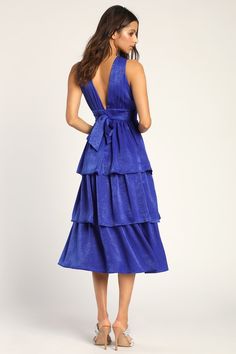 Be the best dressed at your next soiree in the Lulus Peak Party Vibe Cobalt Blue Satin Tiered Tie-Back Midi Dress! Sleek satin shapes this dress that has wide straps that flow into the gathered bodice and frame a plunging V-neckline (and back). A banded waist ties together at back and tops a flouncy, tiered midi skirt. Hidden back zipper/clasp. Fit: This garment fits true to size. Length: Mid-calf length. Size medium measures 47.5" from shoulder to hem. Bust: Great for any cup size. Waist: Fitted - very fitted at natural waist. Hip: Not Fitted - fuller skirt allows room for hips. Undergarments: May be worn with petals, or no bra. Fabric: Fabric has no stretch. Lined. Shell: 100% Polyester. Lining: 88% Polyester, 12% Spandex. Hand Wash Cold. Do Not Bleach. Line Dry. Iron Low Heat. Imported. Cobalt Blue Dress Outfit Wedding, Cobalt Blue Bridesmaid Dresses, Cobalt Blue Outfits, Cobalt Blue Outfit, Blue And Yellow Dress, Blue Lace Midi Dress, 21 Diner, Party Vibe, Blue Satin Dress