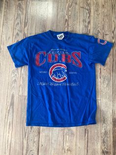 "1990s Chicago cubs tee  LEE SPORT brand  Size tag is washed out approx m/l Sleeve 6\" Chest 19\" Length 27\" Follow us on IG @inezandberyl" Throwback Sports T-shirt With Screen Print, Throwback Cotton T-shirt For Sports, College Throwback T-shirt With Team Logo, Throwback Sports T-shirt With Crew Neck, Throwback Crew Neck Sports T-shirt, Throwback T-shirt For College Sports Season, Throwback College T-shirt For Sports Season, Vintage Team Logo T-shirt For Fans, Vintage Baseball Season Fan Merchandise T-shirt