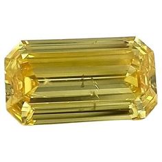 Rare natural vivid yellow diamond 1.08 carat emerald cut, a rare shape in over 1.00 carat diamond, far rarer than the colorless diamond and super rare from Zimmi especially with high color intensity or vividness. GIA certificated. Available as loose stone or can be made into a bespoke piece of high jewelry such as a pendant, ring, earrings, or bracelet. Reach out for a personalised service. Shape and Cutting Style: Emerald Cut Measurements: 8.60 x 4.88 x 2.64 mm Carat Weight: 1.08 carat Color Gr Canary Yellow Diamonds, Canary Birds, Yellow Gems, Yellow Diamonds, Pendant Ring, Fancy Yellow Diamond, Colorless Diamond, Yellow Diamond, High Jewelry