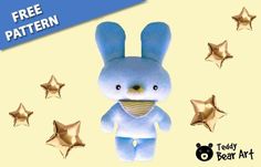 a blue stuffed animal with gold stars around it and the text free pattern on top