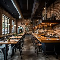 an empty restaurant with wooden tables and chairs