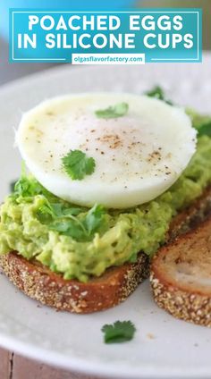 an egg and avocado sandwich is on a plate