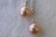 The size of the freshwater pearl is approximately 9.5x10mm, The round freshwater pearls are pinkish purple in color with high luster and is set in sterling silver. It comes with a 16 inch sterling silver pendant. Please visit our shop policies for more details. We will ship out the goods once we have received payment. For more information, Like us on Facebook, follow us on Instagram or visit our website www.ikedapearl.com If you have any questions or inquiries, please don't hesitate to contact u Formal Pink Pearl Necklace With Pearl Charm, Pink Pearl Drop Necklace For Formal Occasions, Formal Pink Pearl Drop Necklace, Pink Round Pearl Necklace Gift, Elegant Pink Pearl Necklace For Anniversary, Pink Pearl Drop Necklace For Gift, Pink Round Pearl Drop Necklace, Pink Pearl Drop Necklace, Pinkish Purple