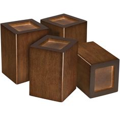 three wooden cubes sitting next to each other