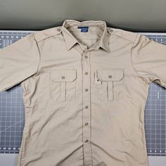 Propper Short Sleeve Uniform Shirt Size Xl. The Shirt Is New Without Tags. The Badge Holder Is Still Attached With A Plastic Hang Tag. The Shirt Is In New Condition With No Flaws Or Defects. #551 Pit-Pit=28 Back=33 One Day Shipping Excluding Sunday And Holidays. Tactical Short Sleeve Tops For Outdoor, Tactical Cotton Tops For Outdoor, Military Short Sleeve Outdoor Shirt, Military Short Sleeve Shirt For Outdoor, Outdoor Military Short Sleeve Shirt, Military Style Short Sleeve Outdoor Shirt, Uniform Shirt, Uniform Shirts, Badge Holder