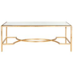 a gold coffee table with glass top