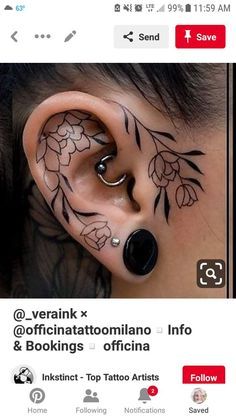 an ear tattoo with flowers on it and the words,'yerink @ effi