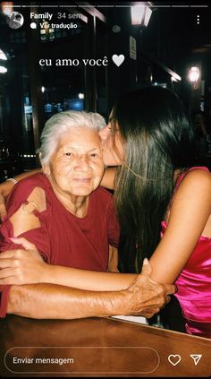 an older man and young woman kissing each other