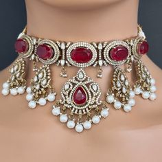 Ruby Victorian Kundan Necklace/Kundan Choker/Bollywood Jewelry/Indian wedding/Bridal jewelry/Indian Wedding/Pakistani/Punjabi This is 100% Handmade jewelry. So Color, shades, texture displayed may slightly vary from the actual product due to digital image limitations. We request you to consider these minor variations. Please expect the possibility of some slight imperfections when buying handmade jewelry. If you have any questions, please message or email us. Arrives in a gift box. Thank you so Bollywood Style Kundan Necklace For Wedding And Festive Occasions, Bollywood Style Kundan Necklace For Wedding, Bollywood Chandbali Bridal Necklace For Wedding, Bollywood Bridal Chandbali Necklace For Wedding, Bollywood Style Necklaces For Eid, Bollywood Style Bridal Necklace For Wedding, Bollywood Style Heavy Lehenga For Eid, Heavy Kundan Necklace For Eid Wedding, Heavy Kundan Necklace For Wedding And Diwali