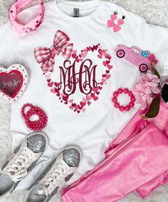 Introducing the "Monogrammed Heart Wreath With Plaid Bow Graphic Shirt," the perfect personalized expression of love for Valentine's Day. This charming shirt features a beautifully designed heart wreath adorned with your own monogram initials, adding a unique and sentimental touch to your festive wardrobe.
The heartwarming design showcases a meticulously crafted wreath of hearts, symbolizing love and affection. Your personalized monogram adds a special and intimate element, making this shirt a meaningful keepsake or a thoughtful gift for a loved one.
To enhance the festive spirit, a stylish plaid bow graces the design, adding a touch of rustic charm and timeless elegance. The combination of the heart wreath and the plaid bow creates a delightful visual harmony, making this shirt a standout Bow Graphic, Monogram Hearts, Expression Of Love, Heart Wreath, Festival Shirts, Plaid Bow, Romantic Dinners, Personalized Monogram, Graphic Shirt