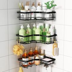 two black shelves filled with different types of soaps and lotions in a white tiled bathroom