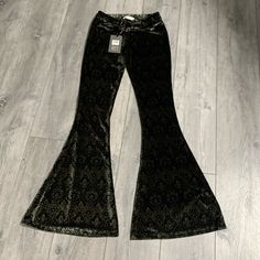 Nwt Modcloth Royal Monk Velvet Bellbottoms Size M. In Excellent Condition. Waist: 14-16” Across Front Hips: 17-20” Across Front Length: 45” Inseam: 35” Rise: 9” Hem At Bottom: 14” Fitted Trousers For Festivals, Fitted Trousers For Festival, Fitted Festival Trousers, Festival Fitted Trousers, Chic Festival Bottoms For Fall, Chic Fitted Bottoms For Festival, Chic Fitted Festival Pants, Elegant Black Bottoms For Festival, Elegant Black Festival Bottoms