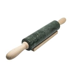 a green rolling pin with wooden handle on a white background