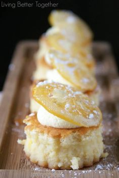 lemon shortcakes with powdered sugar on a cutting board, ready to be eaten