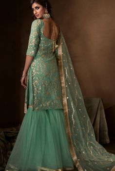 Latest Designer Sharara suit Stitching Option - We will email you the measurement guide to confirm your size. FABRIC: Soft Net DUPPATA FABRIC: Soft Net COLOR: Green WORK: Embroidery SIZE: Can be stitched up-to 46" inches The product will be shipped within 1 - 2 weeks from the date of purchase. Product is returnable if un-Stitched This product qualifies for free shipping For any Rush/Urgent orders please email us at customercare@desiroyale.com We will try our best to accommodate any special reque Green Sharara Suit, Suit Poses, Green Sharara, Punjabi Suits Party Wear, Gharara Suits, Blue Anarkali, Sharara Designs, Suits Accessories, Blouse Tops Designs