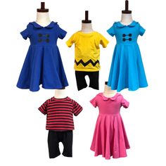 four children's clothing on mannequins in different colors