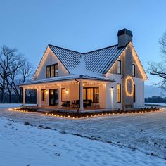 a white house with christmas lights on it