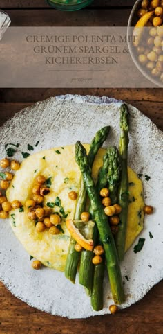 asparagus and chickpeas on a white plate