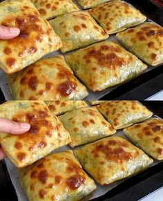 someone is holding up some food in front of other trays filled with different types of pizza