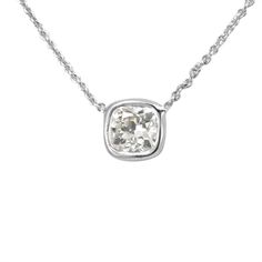 "This cushion cut diamond,  bezel set pendant is hand crafted and cast in solid 14K white gold. soldered in  18\" Rollo Chain. COMPONENT DIAMOND: 1 Cushion Cut Diamond  CARAT WEIGHT: 0.50ct COLOR/CLARITY:  H / SI  METAL:  14K White Gold GRAM WEIGHT:  2.3gr LENGTH:  18 Inches STYLE CODE: NK3950 Item can also be made in 18K  white, yellow, rose  gold and in platinum with additional cost.  Allow us at least 1 - 2 weeks manufacturing period.   Item can be ordered in large quantities.   All of our it Diamond Solitaire Pendant, Ladies Necklace, Cushion Cut Diamond, Solitaire Pendant Necklace, Bezel Pendant, Gold Necklace Women, Cushion Cut Diamonds, Diamond Carat, Solitaire Pendant