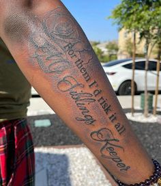 a person with a tattoo on their arm