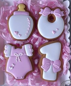 baby shower cookies are in a pink box