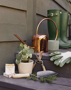 some gardening tools sitting on top of a table